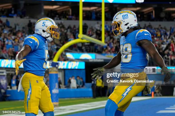 Joshua Palmer of the Los Angeles Chargers celebrates a touchdown with Donald Parham Jr. #89 during the first quarter in the game against the Kansas...