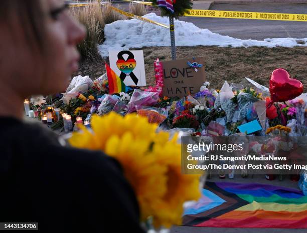 Audrey Herrell brought yellow sunflowers to a memorial near Club Q where a 22-year-old gunman entered an LGBTQ nightclub killing at least five people...