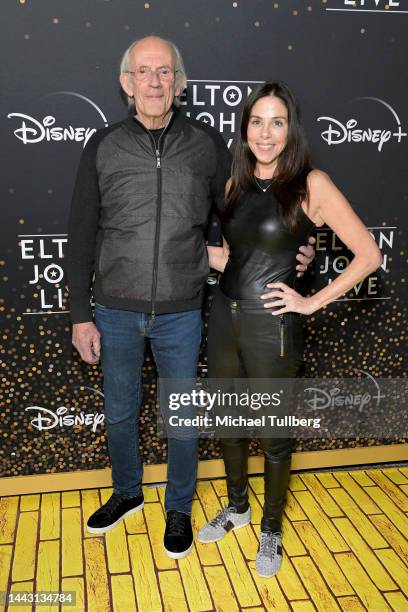 Christopher Lloyd and Lisa Loiacono attend the Disney+ "Elton John Live: Farewell From Dodger Stadium" Yellow Brick Road Event at Dodger Stadium on...