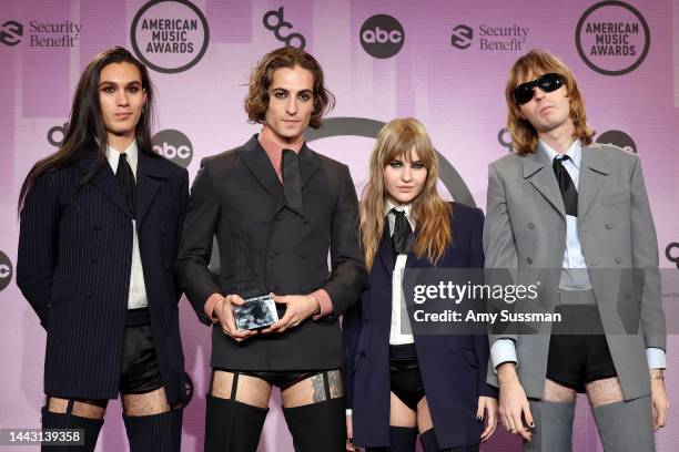 Ethan Torchio, Damiano David, Victoria De Angelis, and Thomas Raggi of Måneskin, winners of the Favorite Rock Song award for 'Beggin,' pose in the...