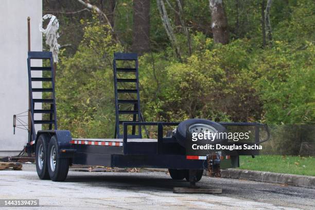 utility trailer with loading ramp - vehicle trailer foto e immagini stock