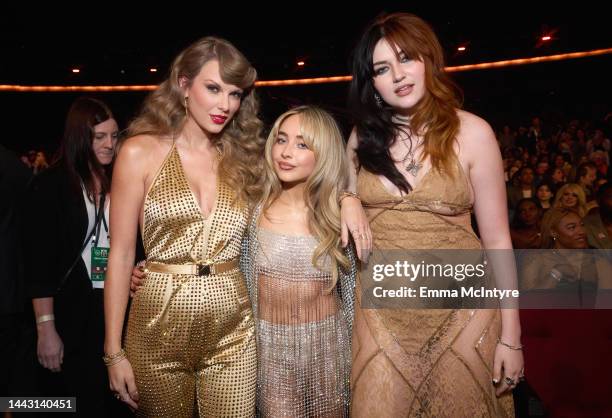 Taylor Swift and Sabrina Carpenter, and Gayle attend the 2022 American Music Awards at Microsoft Theater on November 20, 2022 in Los Angeles,...