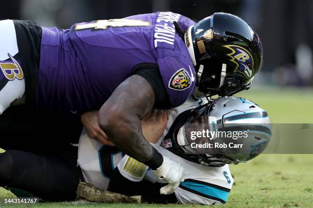 Linebacker Jason Pierre-Paul of the Baltimore Ravens sacks quarterback Baker Mayfield of the Carolina Panthers in the fourth quarter at M&T Bank...