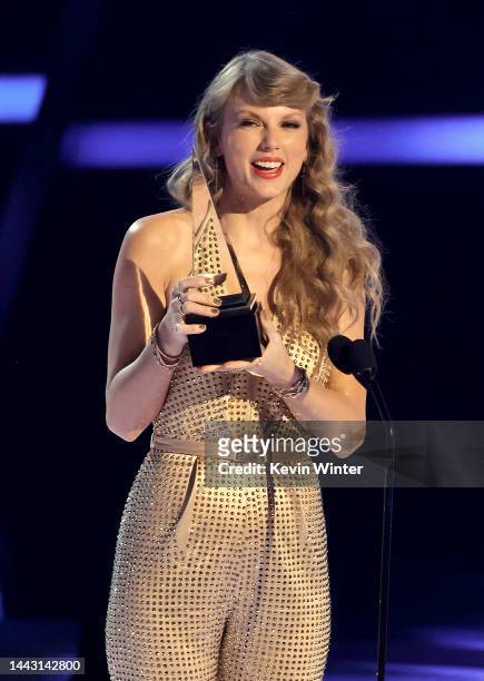 Taylor Swift accepts the Artist of the Year award onstage during the 2022 American Music Awards at Microsoft Theater on November 20, 2022 in Los...