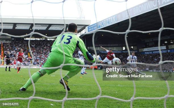 Andre Santos shoots past West Brom keeper Marton Fulop to score the 2nd Arsenal goal during the Barclays Premier League match between West Bromwich...