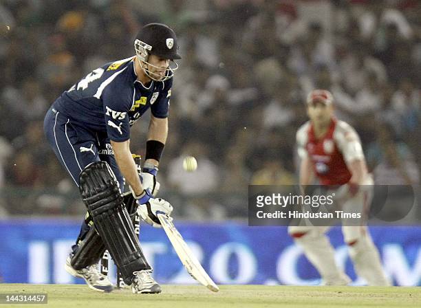 Deccan Chargers batsman Daniel Christian plays a shot during the IPL T20 cricket match played between Kings XI Punjab and Deccan Chargers at PCA...