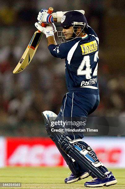 Deccan Chargers batsman Parthiv Patel plays a shot during the IPL T20 cricket match played between Kings XI Punjab and Deccan Chargers at PCA Stadium...