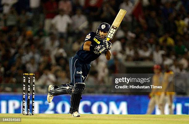 Deccan Chargers batsman Shikhar Dhawan plays a shot during the IPL T20 cricket match played between Kings XI Punjab and Deccan Chargers at PCA...