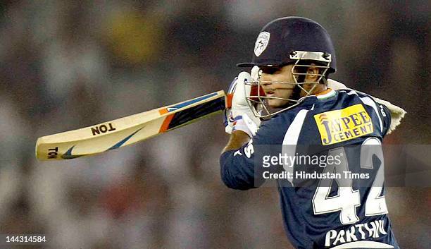 Deccan Chargers batsman Parthiv Patel plays a shot during the IPL T20 cricket match played between Kings XI Punjab and Deccan Chargers at PCA Stadium...