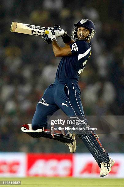 Deccan Chargers batsman Shikhar Dhawan plays a shot during the IPL T20 cricket match played between Kings XI Punjab and Deccan Chargers at PCA...