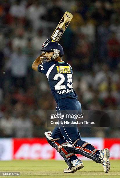 Deccan Chargers batsman Shikhar Dhawan plays a shot during the IPL T20 cricket match played between Kings XI Punjab and Deccan Chargers at PCA...