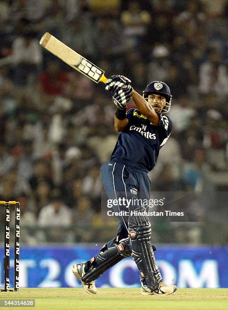 Deccan Chargers batsman Shikhar Dhawan plays a shot during the IPL T20 cricket match played between Kings XI Punjab and Deccan Chargers at PCA...