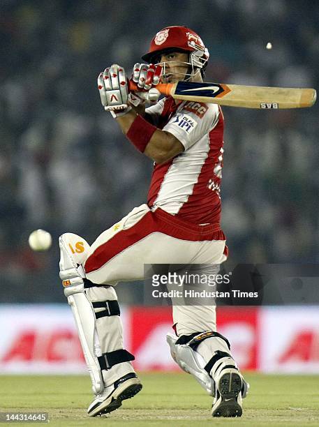 Kings XI Punjab batsman Mandeep Singh plays a shot during the IPL T20 cricket match played between Kings XI Punjab and Deccan Chargers at PCA Stadium...