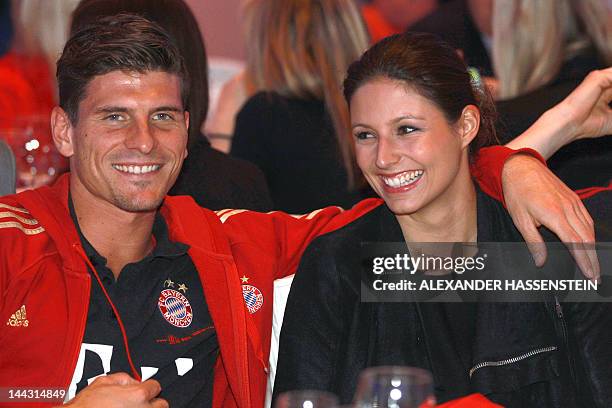 Bayern Munich's striker Mario Gomez and his partner Silvia Meichel attend an event of Bayern Munich in Berlin, on May 13, 2012. The event takes place...