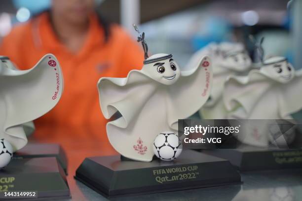 Employee make figurines of the FIFA World Cup Qatar 2022 mascot La'eeb at a factory on November 15, 2022 in Dongguan, Guangdong Province of China.