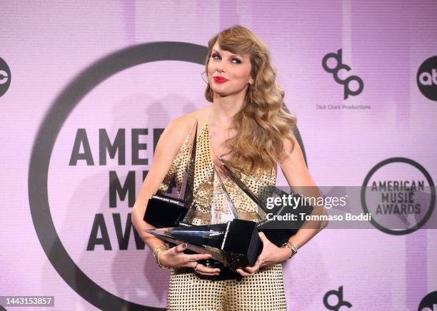 Taylor Swift, winner of Favorite Pop Album, Favorite Female Pop Artist, Favorite Music Video, Favorite Country Album, Favorite Female Country Artist,...