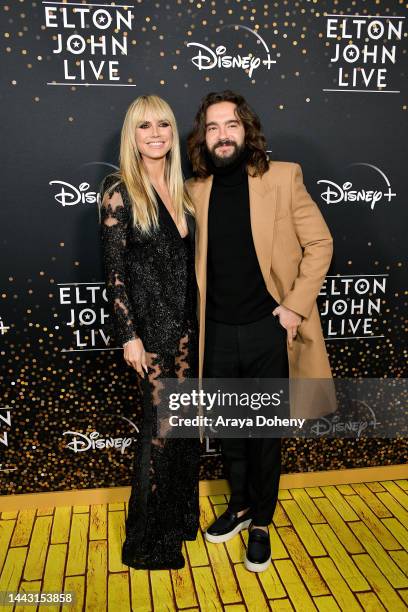 Heidi Klum and Tom Kaulitz attend the Disney+ "Elton John Live: Farewell From Dodger Stadium" Yellow Brick Road Event at Dodger Stadium on November...