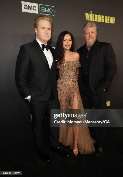 Josh McDermitt, Christian Serratos, and Michael Cudlitz arrive at The Walking Dead Live: The Finale Event at The Orpheum Theatre on November 20, 2022...