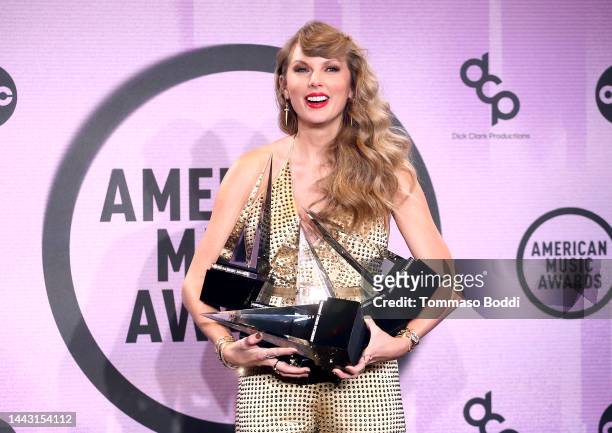 Taylor Swift, winner of Favorite Pop Album, Favorite Female Pop Artist, Favorite Music Video, Favorite Country Album, Favorite Female Country Artist,...