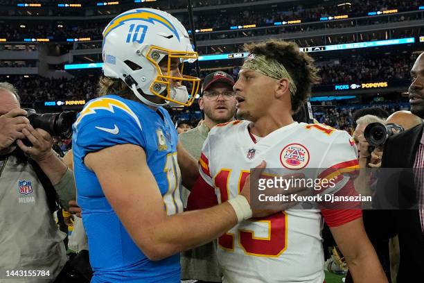 Justin Herbert of the Los Angeles Chargers and Patrick Mahomes of the Kansas City Chiefs embraces after the game at SoFi Stadium on November 20, 2022...