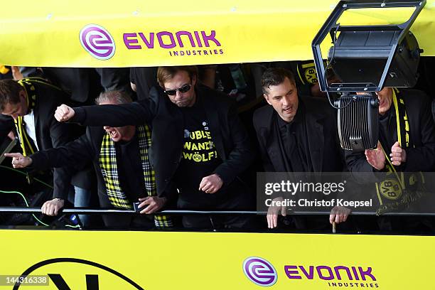 Head coach Juergen Klopp and manager Michael Zorc of Dortmund celebrate during a parade at Borsigplatz celebrating Borussia Dortmund's Bundesliga and...