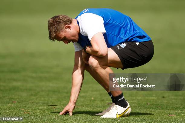 Josh Goater of the Kangaroos reacts during a North Melbourne Kangaroos training session at Arden Street Oval on November 21, 2022 in Melbourne,...