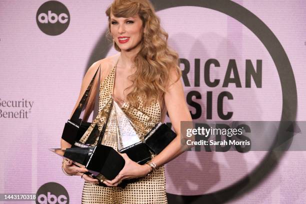Taylor Swift, winner of Favorite Pop Album, Favorite Female Pop Artist, Favorite Music Video, Favorite Country Album, Favorite Female Country Artist,...