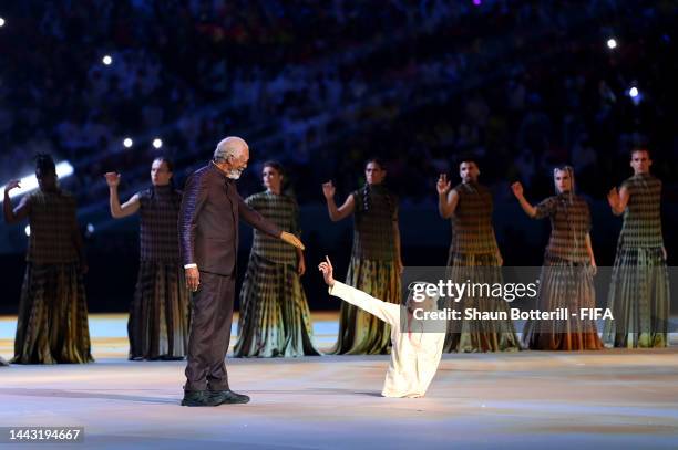 Morgan Freeman and Ghanim Al Muftah perform during the opening ceremony prior during the FIFA World Cup Qatar 2022 Group A match between Qatar and...