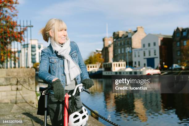 morning cycle to work - leith edinburgh stock pictures, royalty-free photos & images