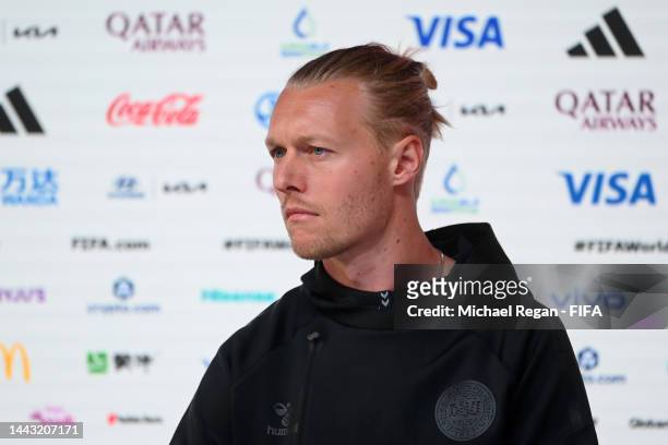 Simon Kjaer of Denmark looks on during the Denmark match day -1 Press Conference at Main Media Center on November 21, 2022 in Doha, Qatar.