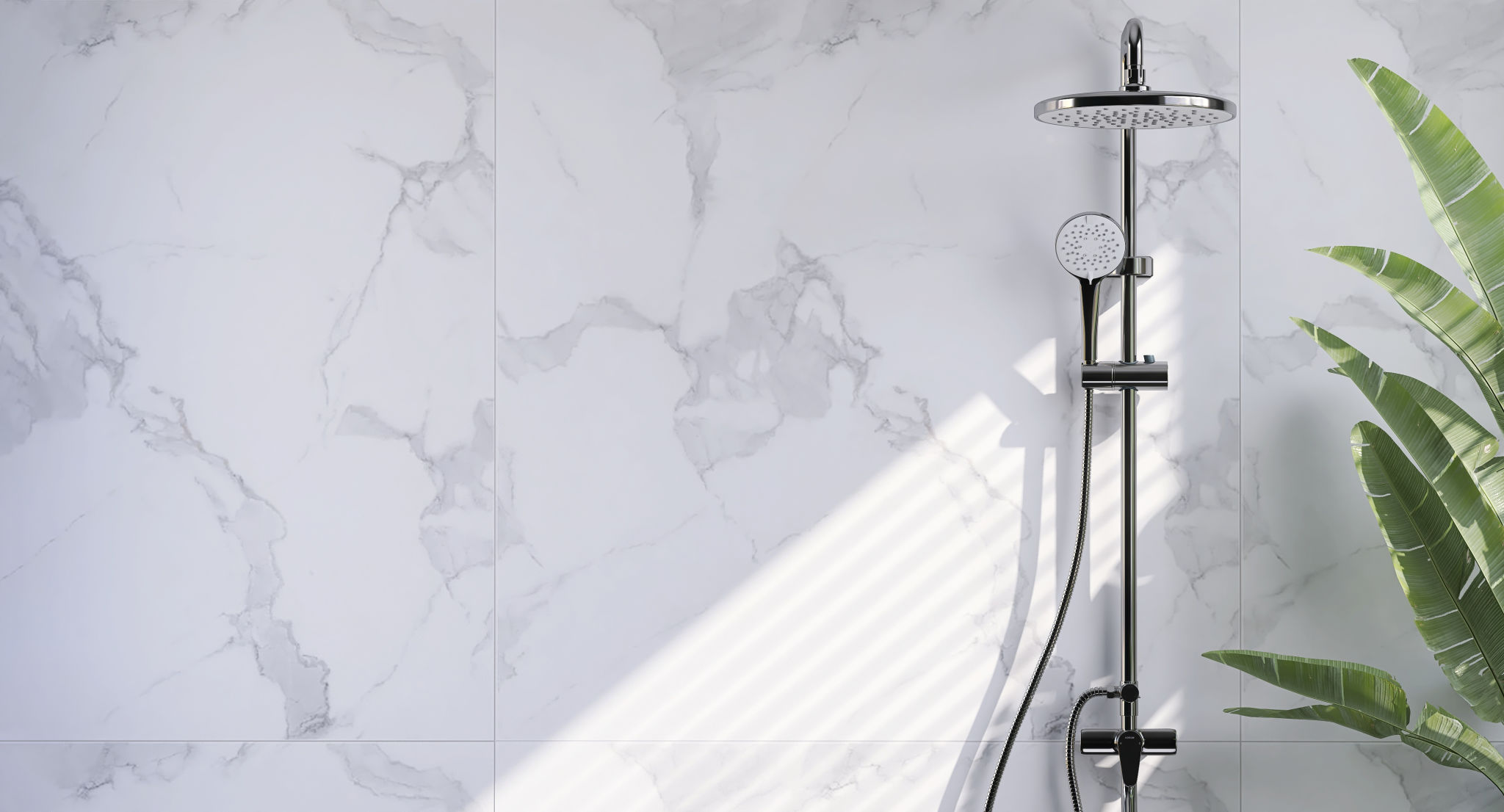 Modern and minimal bathroom design with shiny stainless steel rain shower, shower head on slide bar on beautiful white marble wall and banana tree with sunlight from window blinds Modern and minimal bathroom design with shiny stainless steel rain shower, shower head on slide bar on beautiful white marble wall and banana tree with sunlight from window blinds