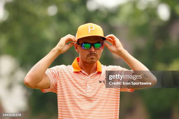 Golfer Rickie Fowler adjusts his sunglasses on the 8th hole on July 2 during the final round of the Rocket Mortgage Classic at the Detroit Golf Club...