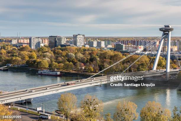 most snp bridge across the danube river in bratislava - bratislava slovakia stock pictures, royalty-free photos & images