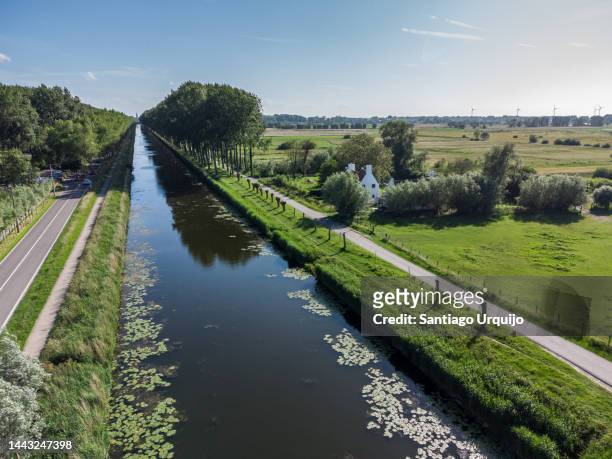 aerial view of damse vaart canal - west vlaanderen stockfoto's en -beelden