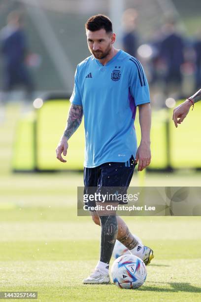 Lionel Messi of Argentina looks on during the Argentina Training Session at Qatar University training facilities on November 21, 2022 in Doha, Qatar.
