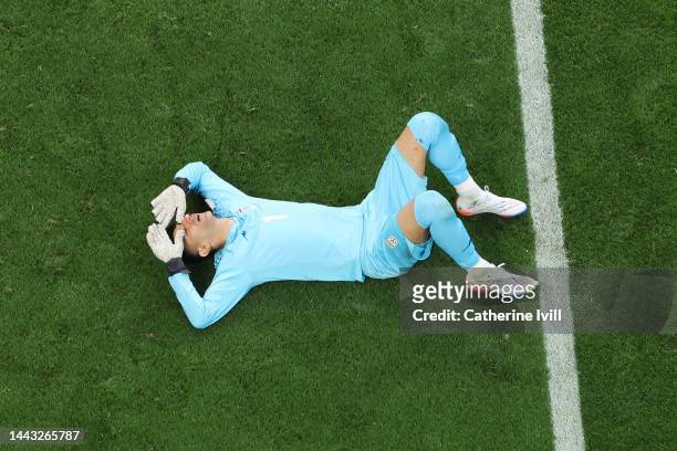 Alireza Beiranvand of IR Iran lies injured during the FIFA World Cup Qatar 2022 Group B match between England and IR Iran at Khalifa International...