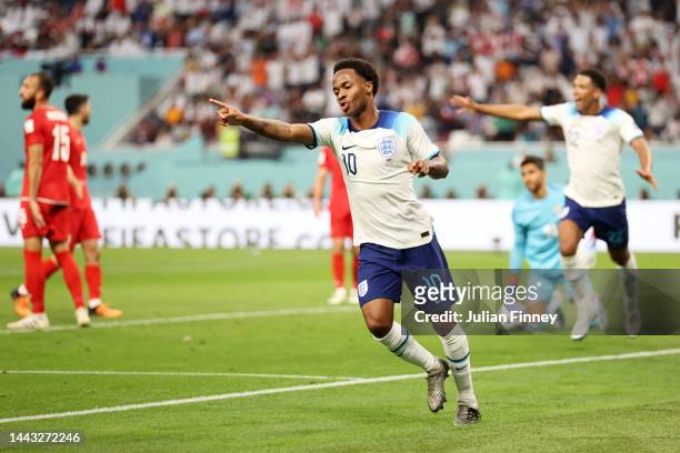 Raheem Sterling of England celebrates after scoring their team's third goal during the FIFA World Cup Qatar 2022 Group B match between England and IR...
