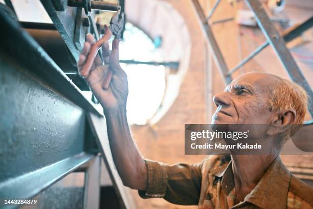 Man Fixing Clock Old Man Fixing Clock Photos and Premium High Res Pictures - Getty Images