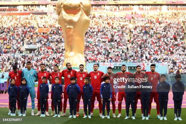 Iran players line up for the national anthem prior to the FIFA World Cup Qatar 2022 Group B match between England and IR Iran at Khalifa...