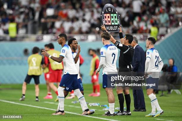 Marcus Rashford replaces Raheem Sterling of England during the FIFA World Cup Qatar 2022 Group B match between England and IR Iran at Khalifa...