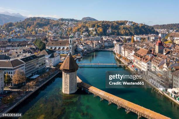 switzerland, canton of lucerne, lucerne, aerial view of historic chapel bridge in autumn - circa 14th century stock pictures, royalty-free photos & images