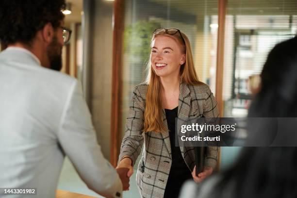 first impressions - female suit stockfoto's en -beelden