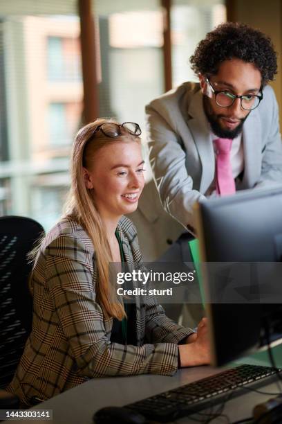 young business graduate with supervisor - law office stock pictures, royalty-free photos & images