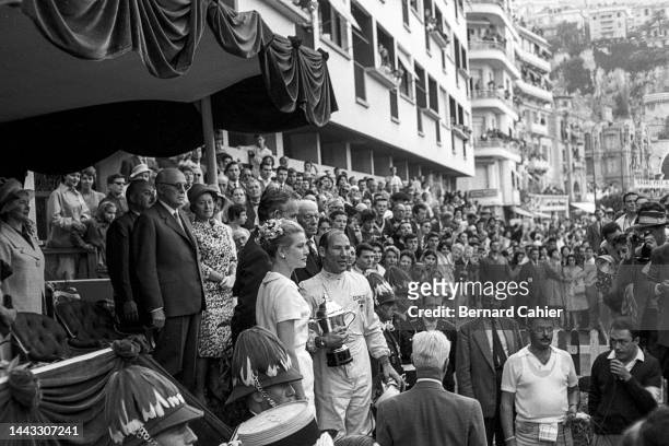 Stirling Moss, Princess Grace of Monaco, Grand Prix of Monaco, Circuit de Monaco, 29 May 1960. Stirling Moss on the victory podium with Princess...