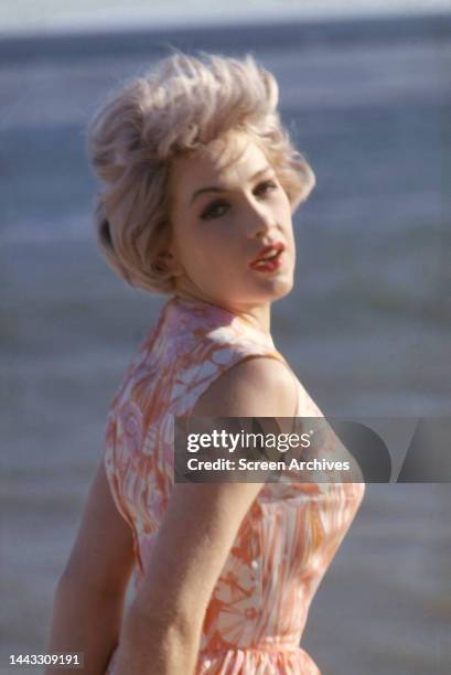 Stella Stevens circa 1960 by ocean.