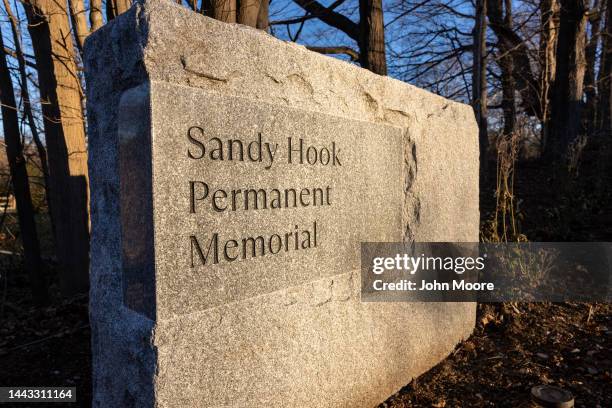 Stone marks the entryway to a memorial near the site of the 2012 Sandy Hook massacre on November 20, 2022 in Newtown, Connecticut. This December 14...