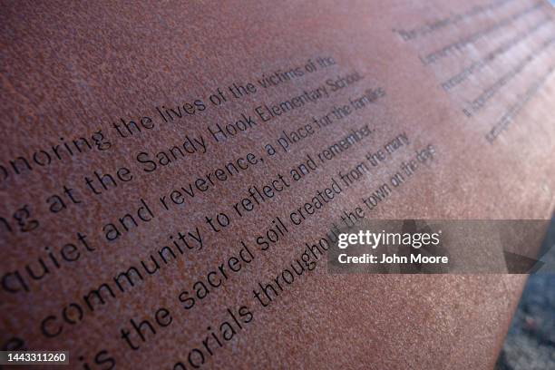 An engraved plaque marks the entrance to the newly opened Sandy Hook Permanent Memorial near the site of the 2012 Sandy Hook massacre on November 20,...