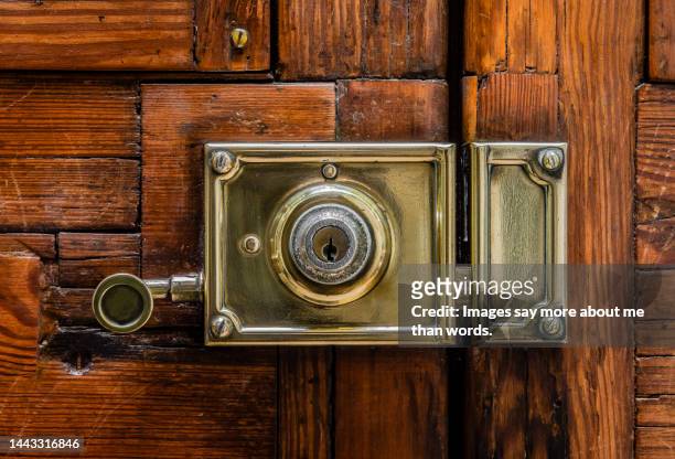 door lock made of old brass. close up - door lock stock pictures, royalty-free photos & images