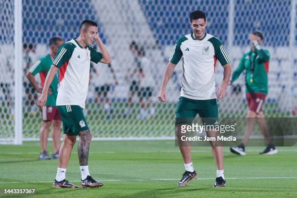 Roberto Alvarado and Raul Jimenez of Mexico controls the ball during the Mexico Training Session at on November 21, 2022 in Doha, Qatar.