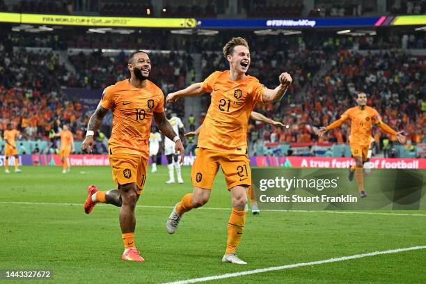 Memphis Depay and Frenkie de Jong of Netherlands celebrate their team's second goal by Davy Klaassen during the FIFA World Cup Qatar 2022 Group A...